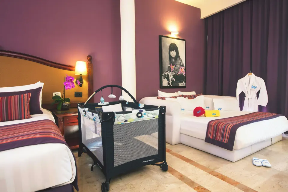 Family Selection Junior Suite crib and sofa bed at Grand Palladium Vallarta Resort & Spa.