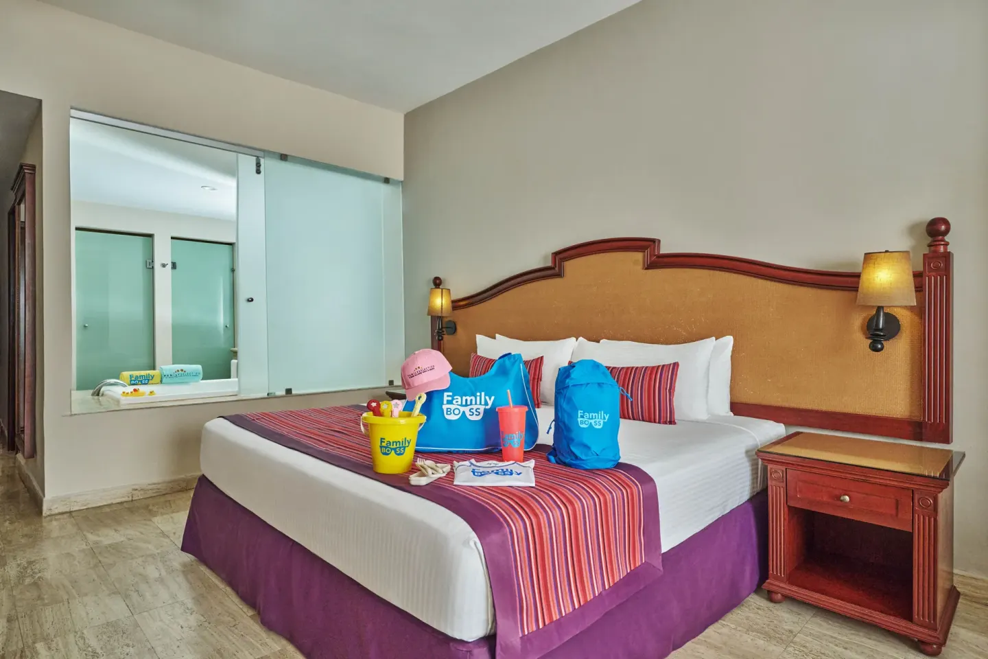Family Selection Junior Suite king bed with family welcome gifts at Grand Palladium Vallarta Resort & Spa.