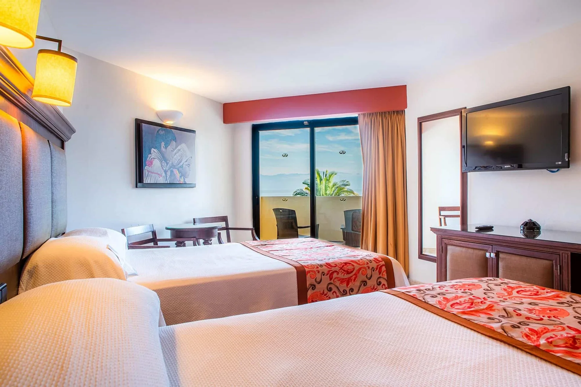 Suite Panoramic Ocean View two beds and balcony at Grand Palladium Vallarta Resort & Spa.