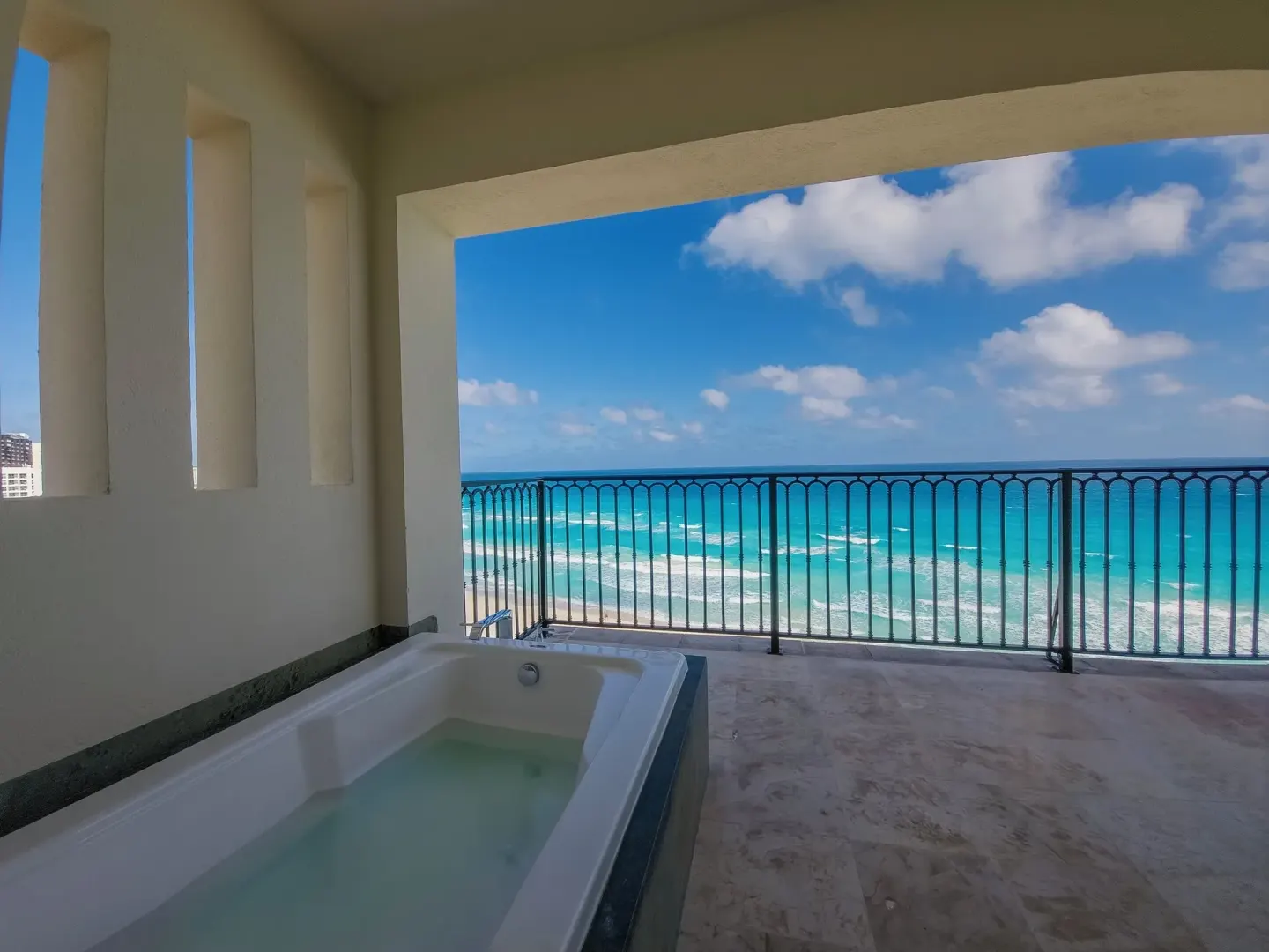 Balcony bathtub overlooking the Caribbean Sea at Grand Park Royal Cancun.