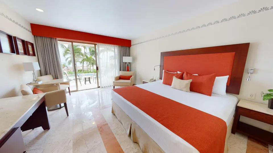 Deluxe Swim Up king bedroom with patio at Grand Park Royal Cancun.