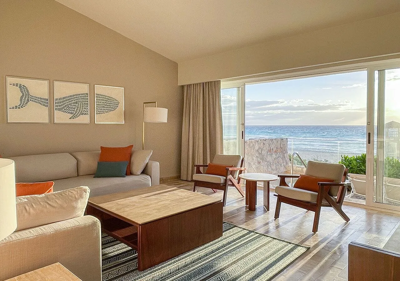 Ocean-front living room in the Grand Villa Master Suite at Grand Park Royal Cancun.