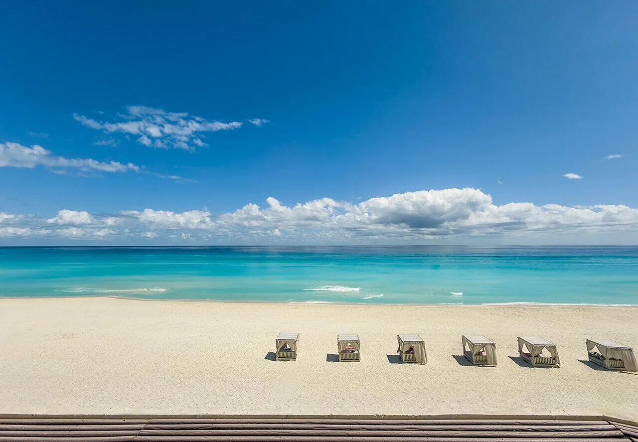 Beach and turquoise ocean view from Grand Park Royal Cancun.