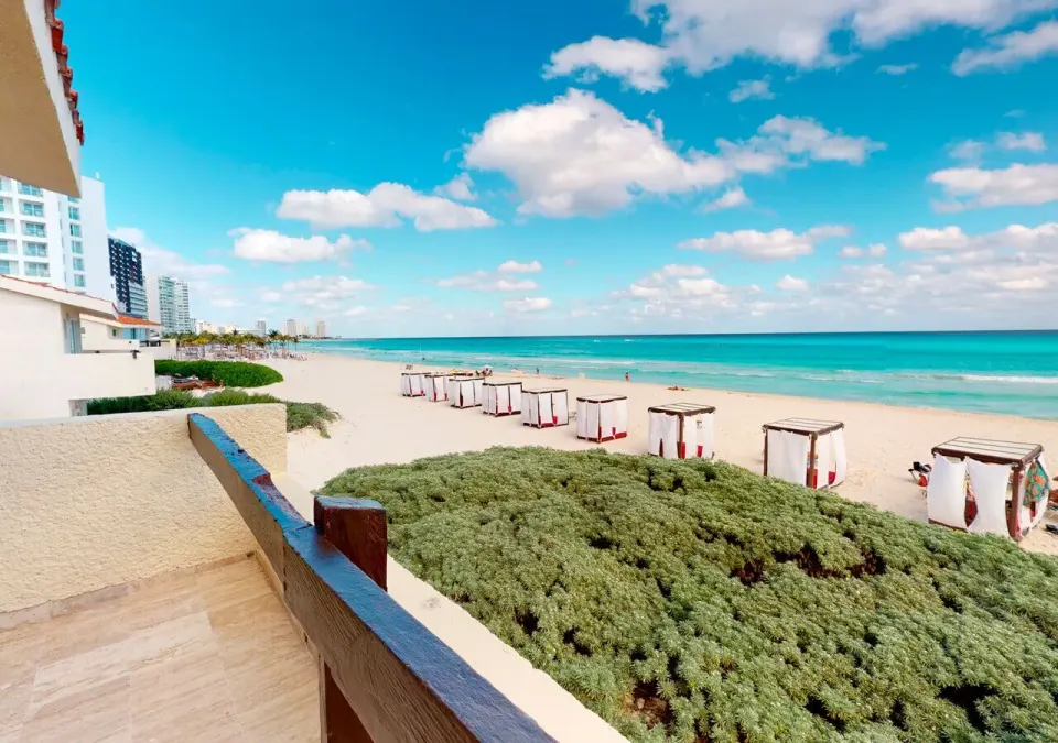 Villa Deluxe Ocean Front balcony beach view at Grand Park Royal Cancun.