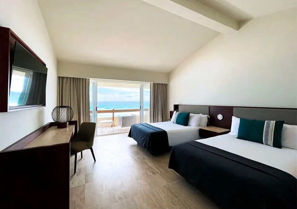 Villa Deluxe Ocean Front two-bed room with ocean view at Grand Park Royal Cancun.