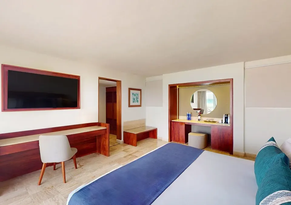 Villa Premier Plungepool Oceanfront king room desk and vanity at Grand Park Royal Cancun.