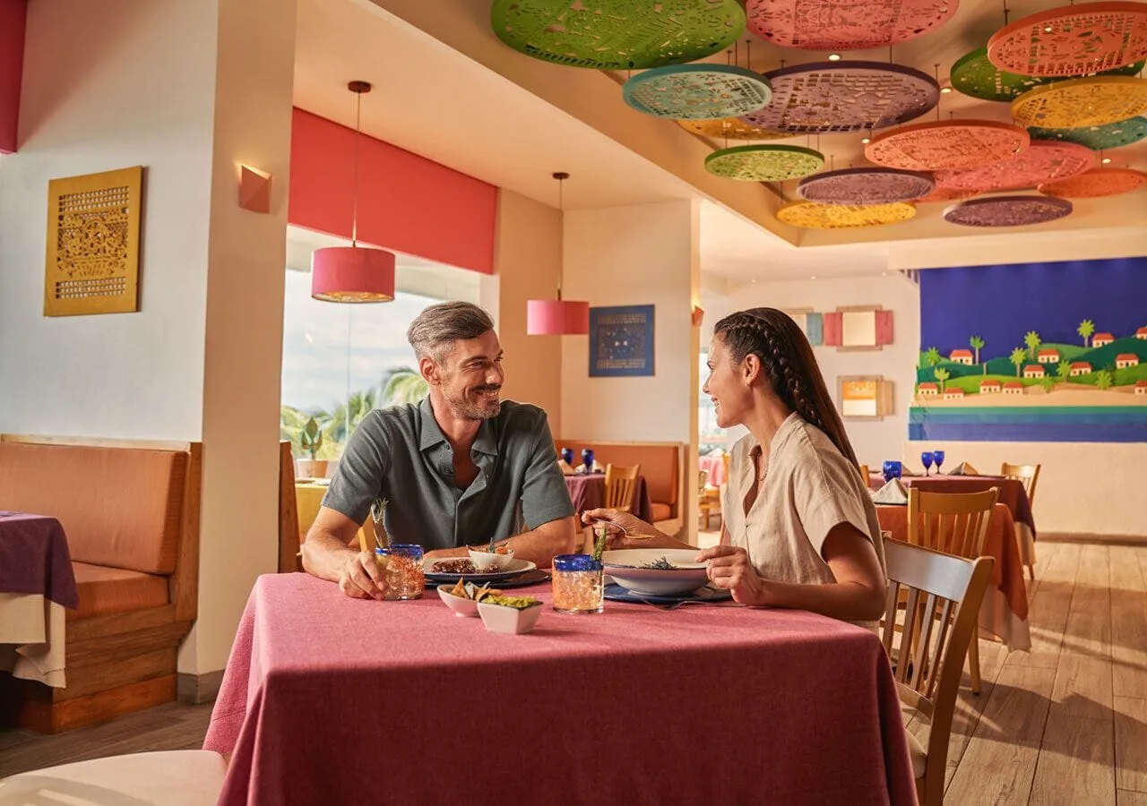 Colorful Mexican-style dining room at Grand Park Royal Puerto Vallarta.