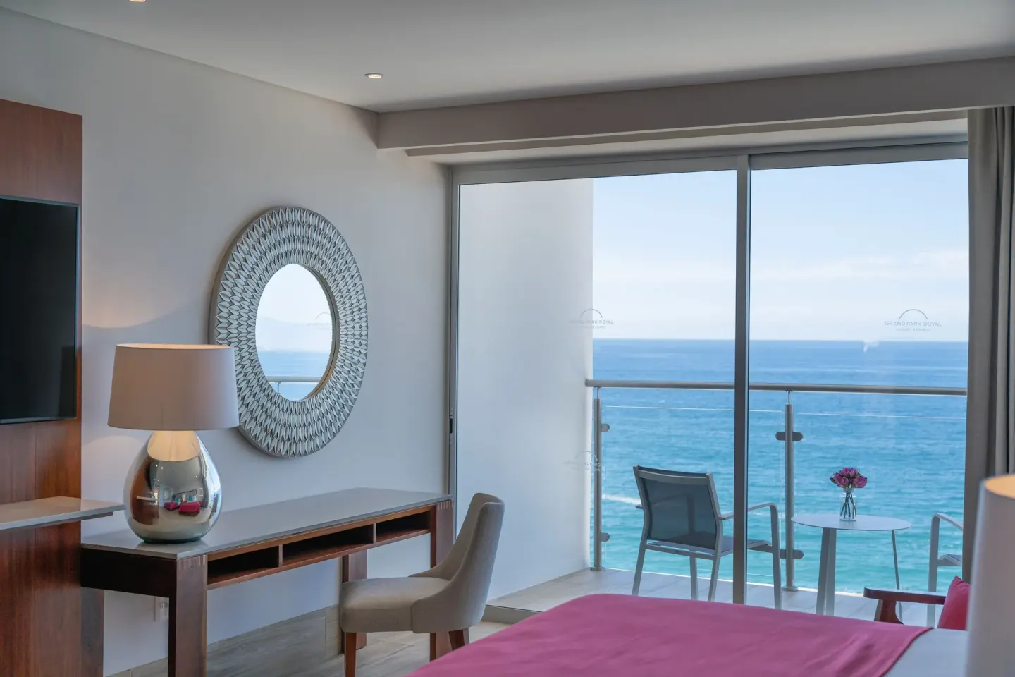 Deluxe Room balcony with ocean view at Grand Park Royal Puerto Vallarta.