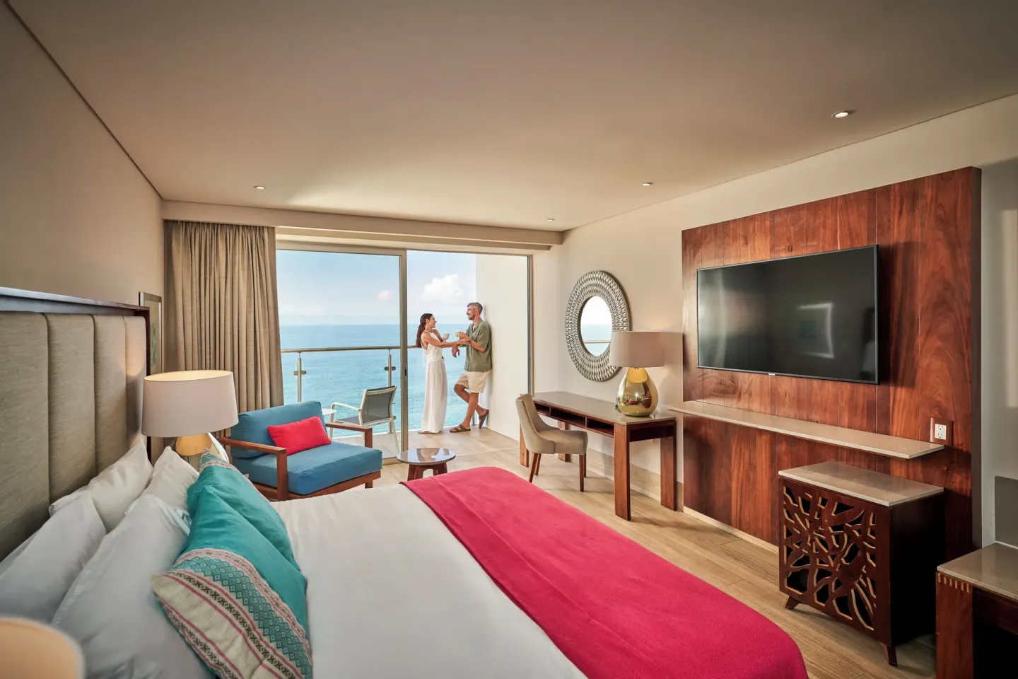 Deluxe king room with ocean-facing balcony at Grand Park Royal Puerto Vallarta.