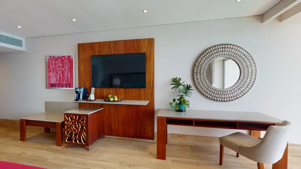 Premier Ocean Front room media wall and desk at Grand Park Royal Puerto Vallarta.