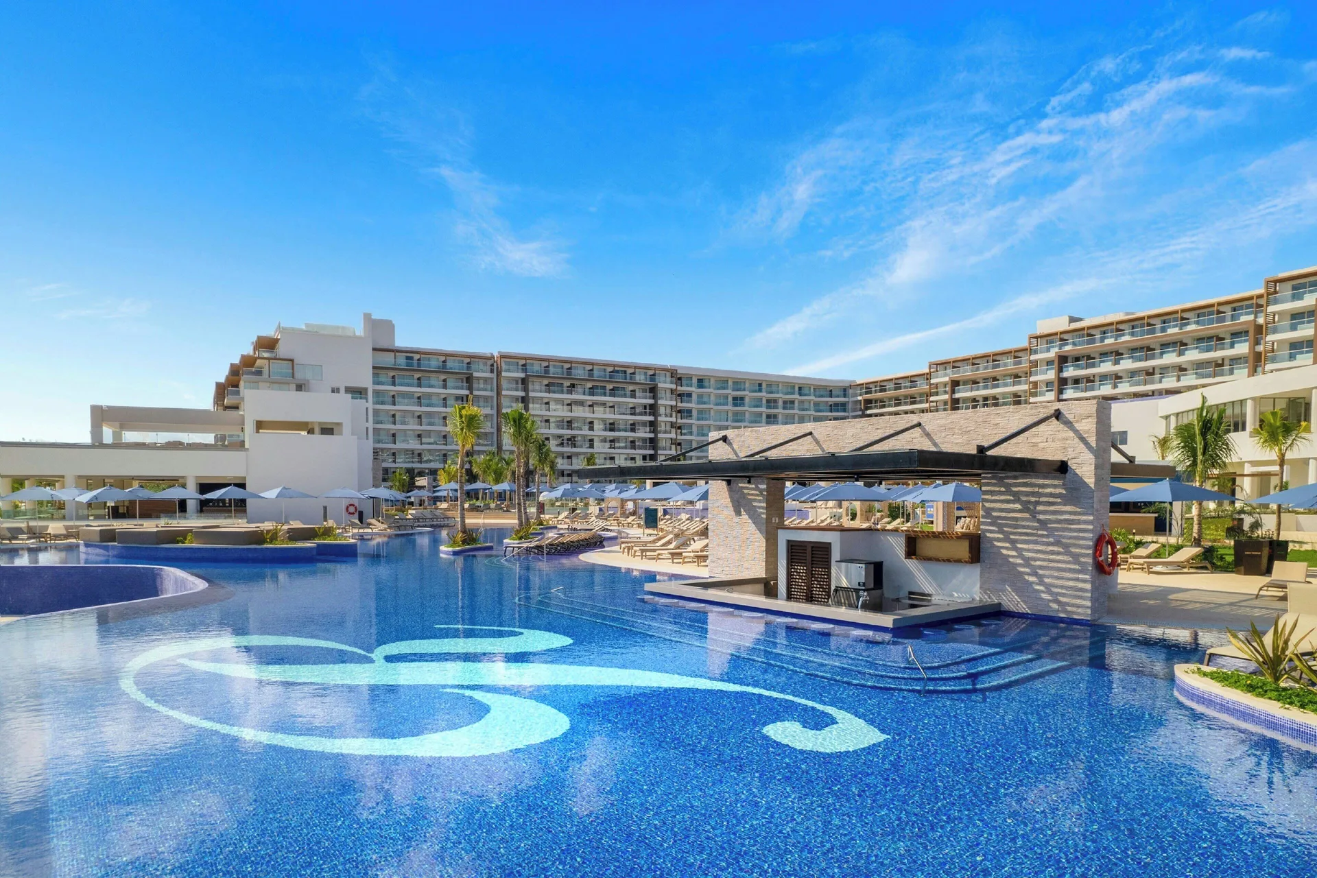 Royalton Splash Riviera Cancun family-friendly all-inclusive resort with water park, slides and modern pools