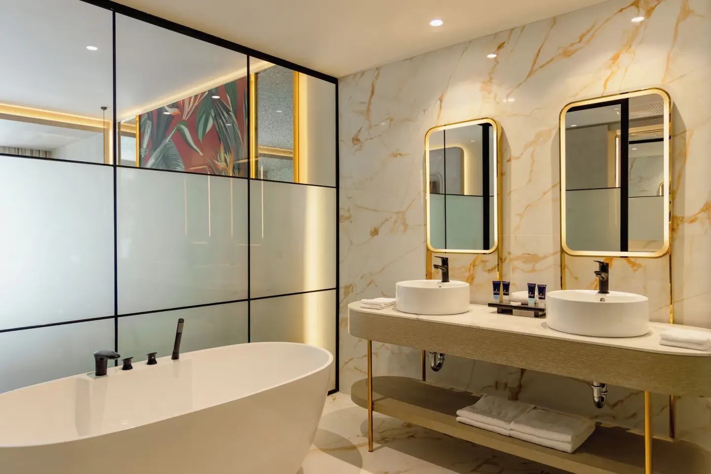 Marble bathroom with freestanding tub and double vanity at Grand Riviera Princess.
