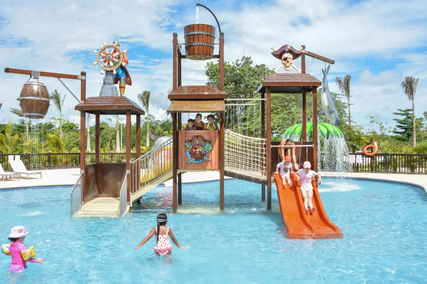Children's pirate water play area with slides at Grand Riviera Princess.