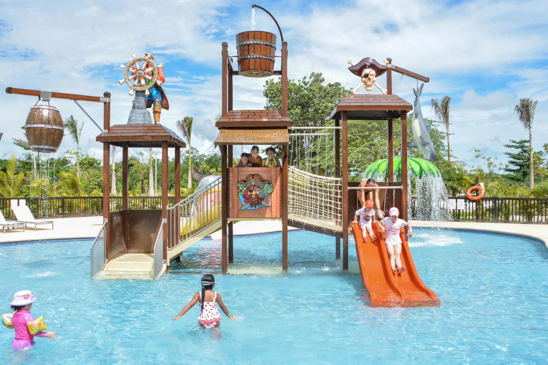 Children's pirate water play area with slides at Grand Riviera Princess.