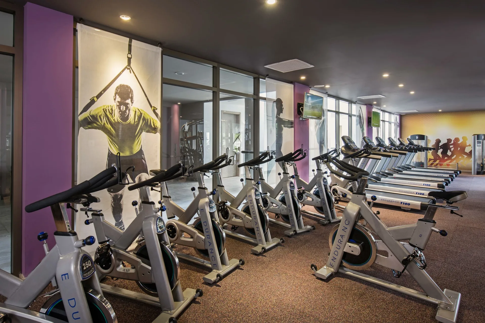 Fitness room with stationary bikes and treadmills at Grand Riviera Princess.