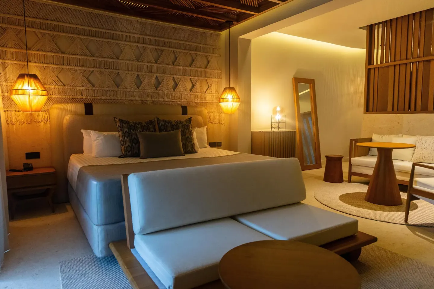 Guest room king bed with daybed, mirror and sitting area at Grand Riviera Princess.