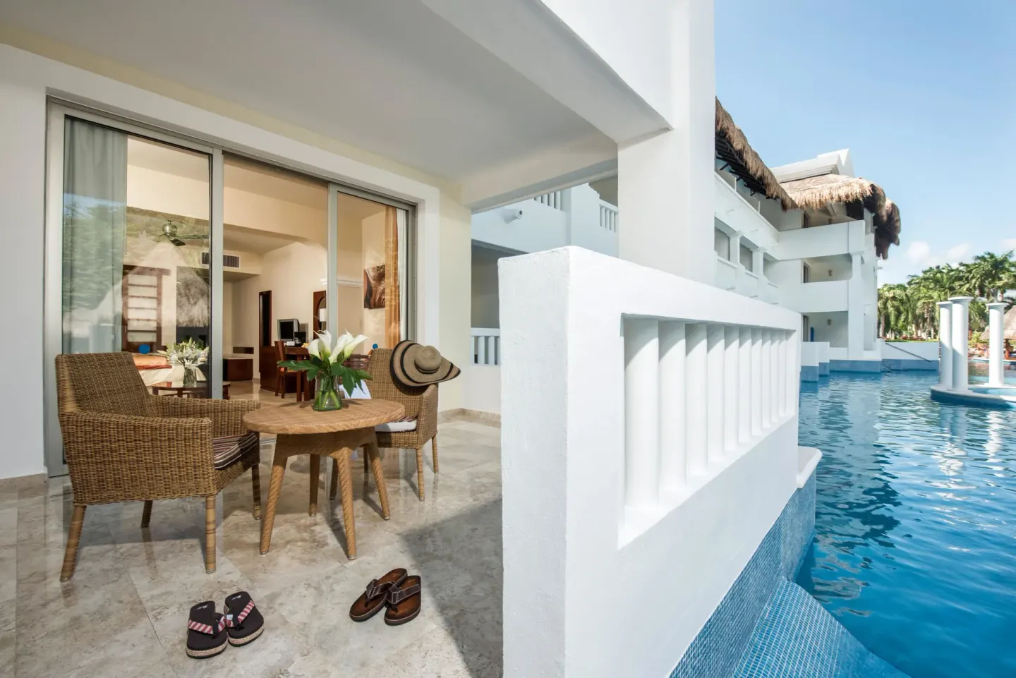 Deluxe Pool Access terrace beside the pool at Grand Riviera Princess.
