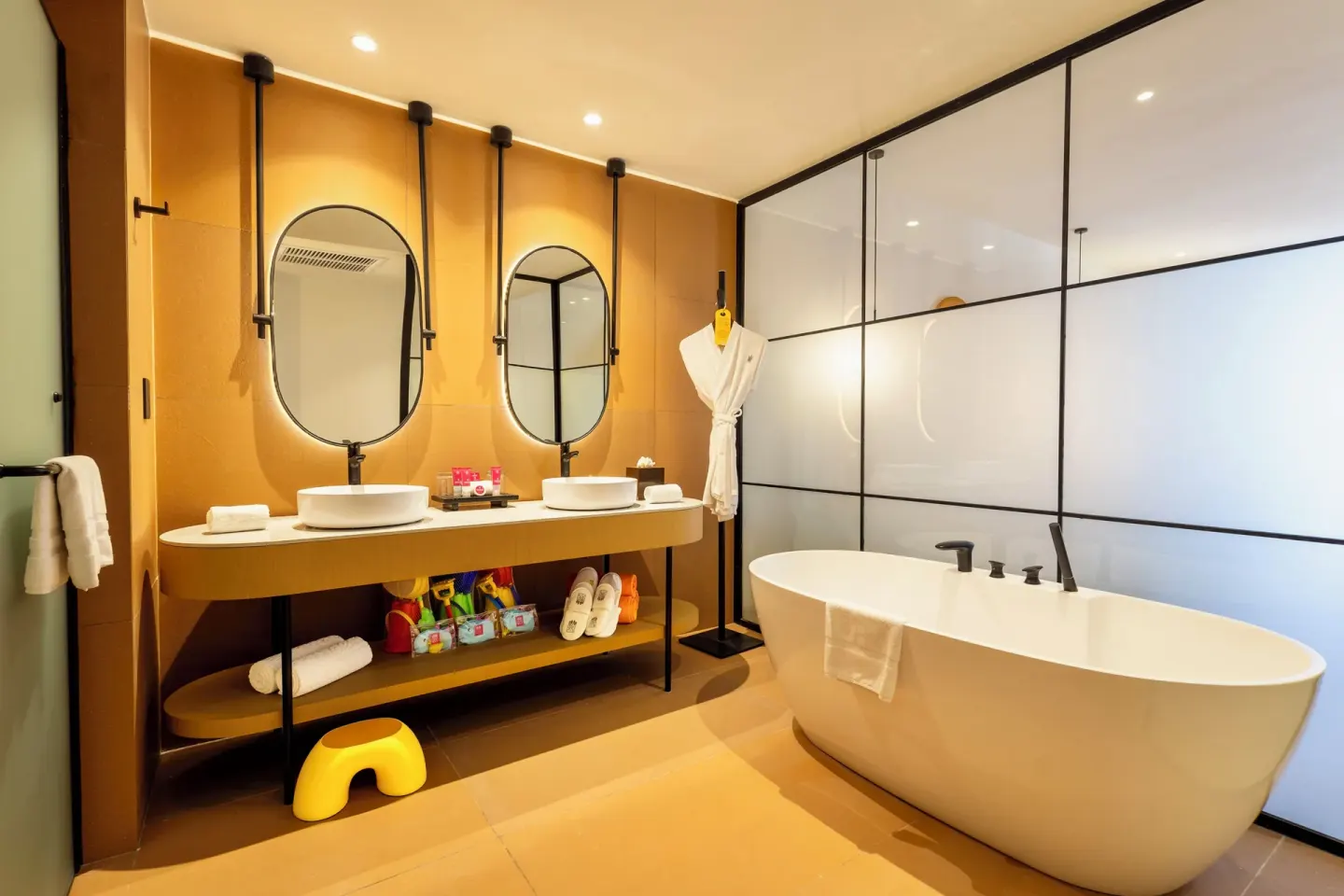 Family Club Deluxe bathroom with double sinks and freestanding tub at Grand Riviera Princess.