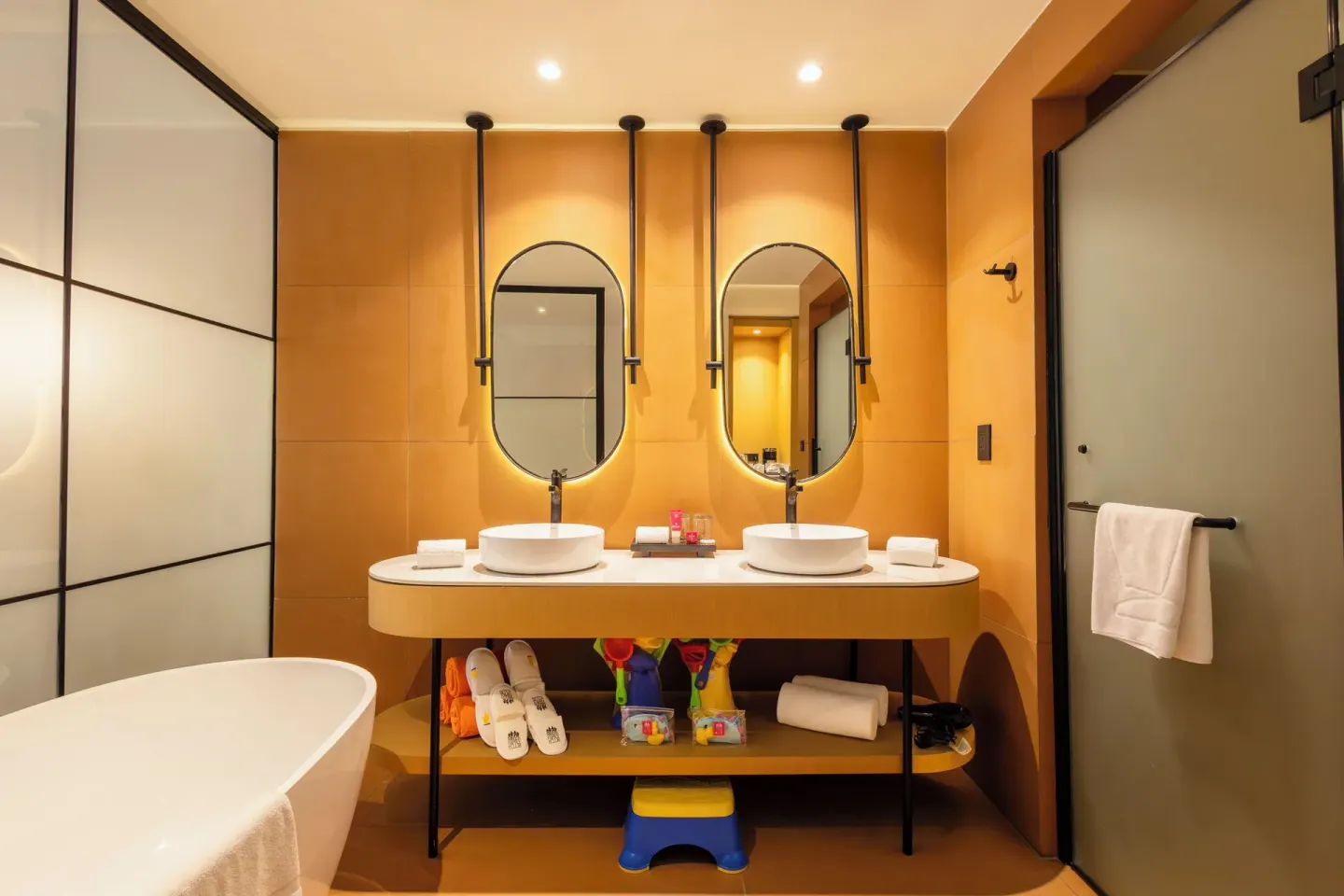 Family Club Pool Access bathroom with double sinks at Grand Riviera Princess.