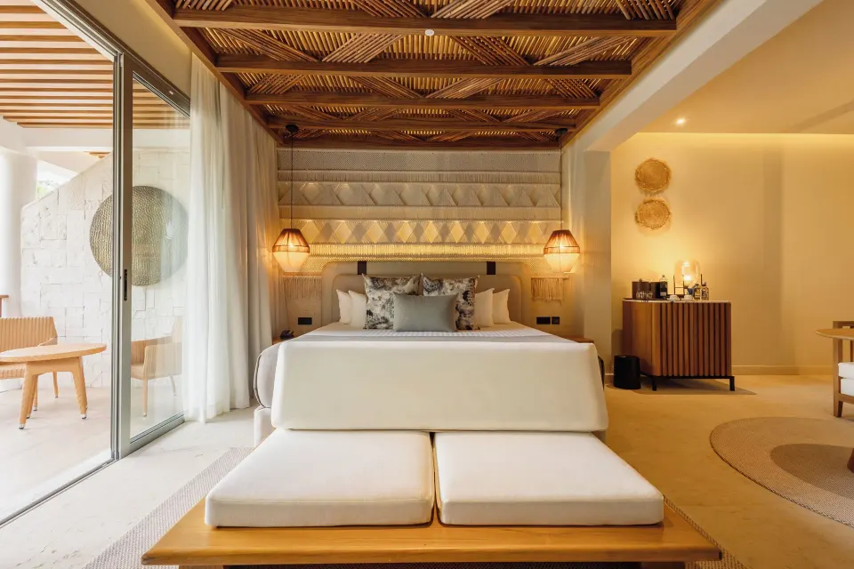 Laguna Villa Suite king bed and terrace doors at Grand Riviera Princess.