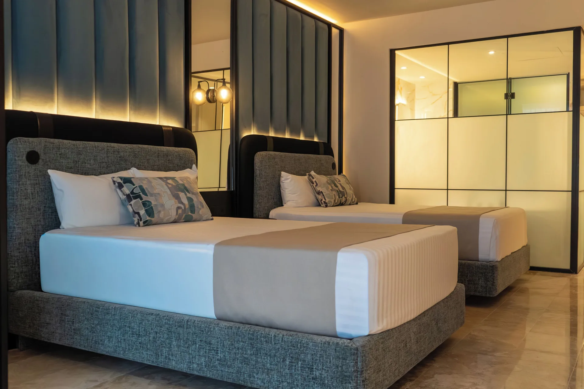 Two beds in a Platinum Suite Plunge Pool room at Grand Riviera Princess.