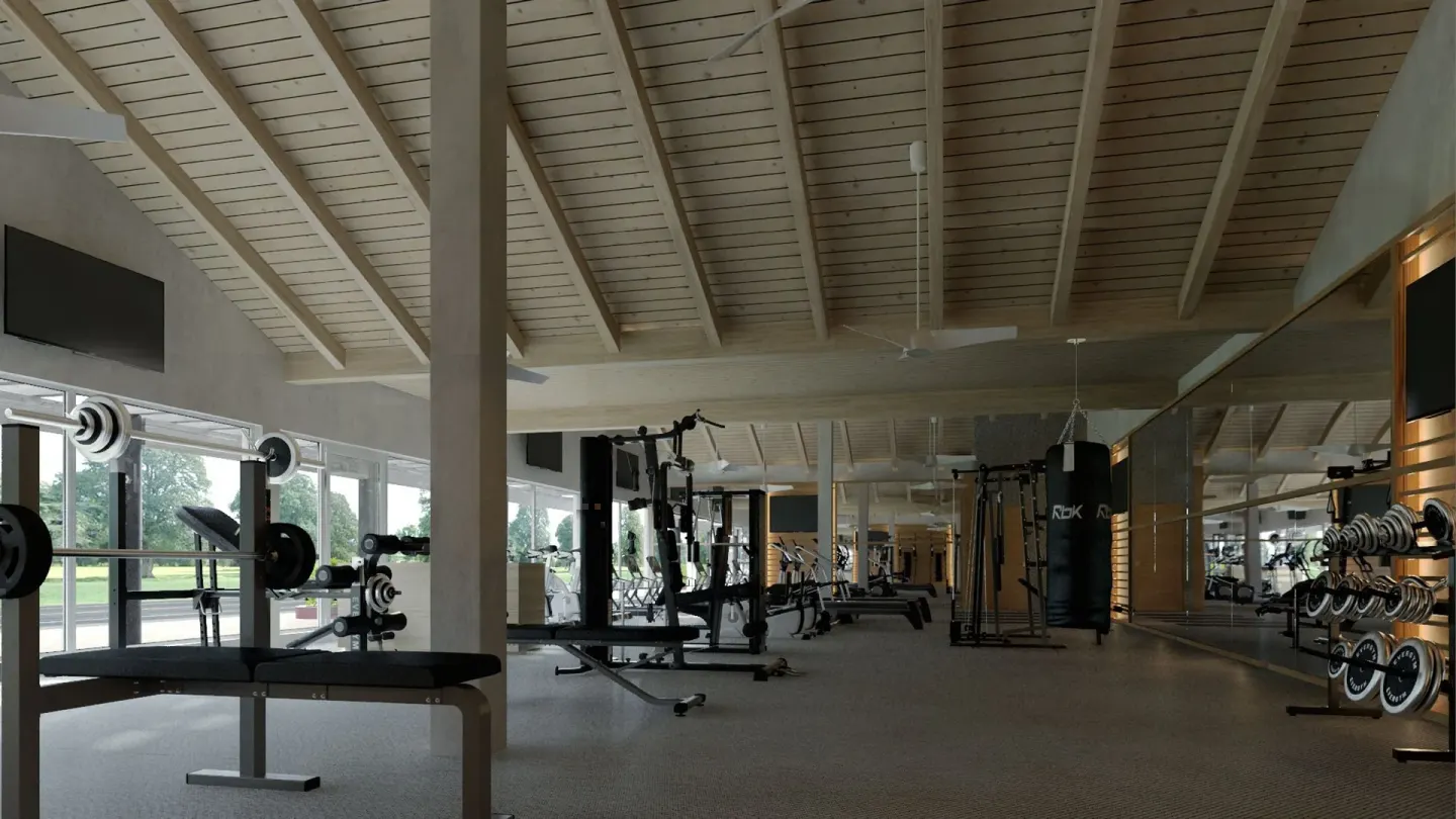 Weight benches and dumbbell racks in the gym at Grand Sirenis Punta Cana Resort & Aquagames.