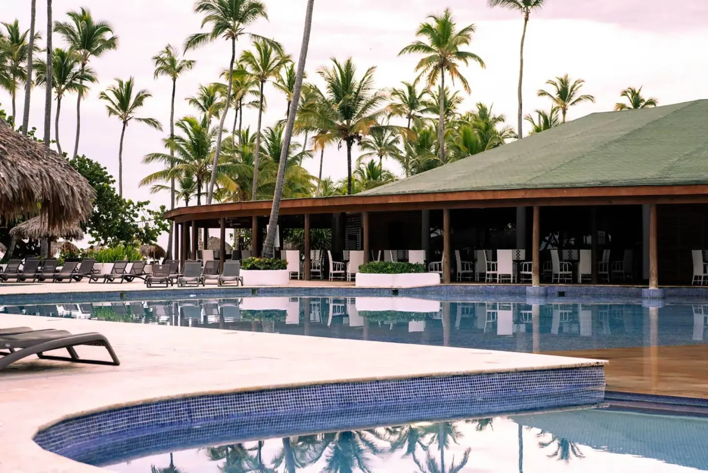 Quiet pool beside an open-air pavilion at Grand Sirenis Punta Cana Resort & Aquagames.