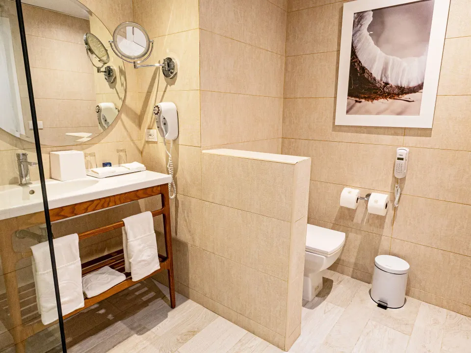 Suite bathroom vanity and toilet area at Grand Sirenis Punta Cana Resort & Aquagames.