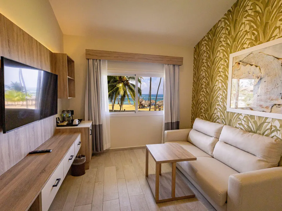 Ocean-view living area in a Family Suite at Grand Sirenis Punta Cana Resort & Aquagames.