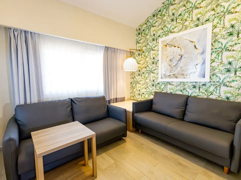 Separate sitting room in a Family Suite at Grand Sirenis Punta Cana Resort & Aquagames.