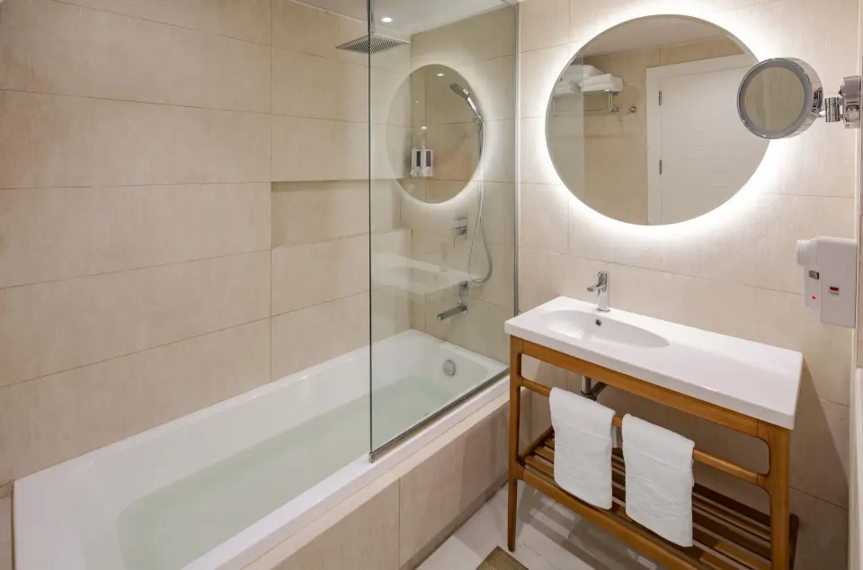 Standard Room bathroom with bathtub at Grand Sirenis Punta Cana Resort & Aquagames.