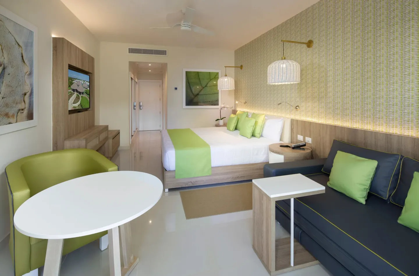Standard Room with one bed and sofa at Grand Sirenis Punta Cana Resort & Aquagames.