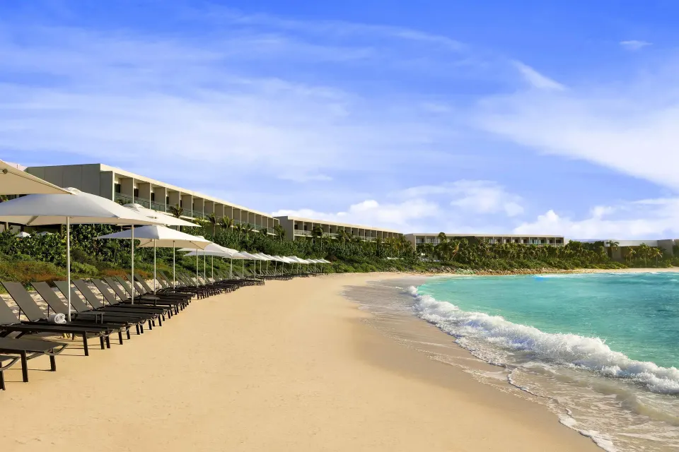 Hilton Tulum Riviera Maya All-Inclusive Resort large branded family-friendly all-inclusive resort with modern pools and beachfront buildings in Tulum, Mexico.