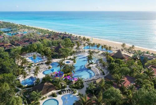 Iberostar Waves Tucán family-friendly all-inclusive resort in Playacar with jungle landscaping and beachfront pool in Playa del Carmen, Mexico.