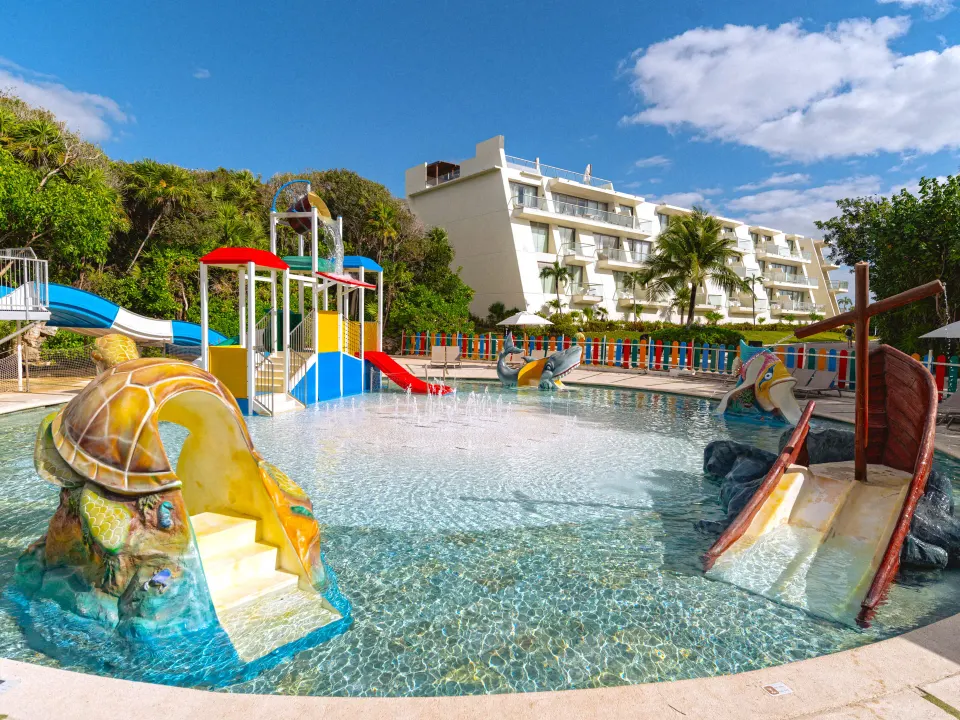 Children's water park with slides and shallow splash pool at Grand Sirenis Riviera Maya Resort & Spa