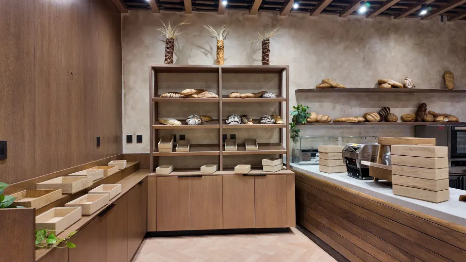 Bakery display and bread shelving in a hotel food-prep area at Grand Sirenis Riviera Maya Resort & Spa