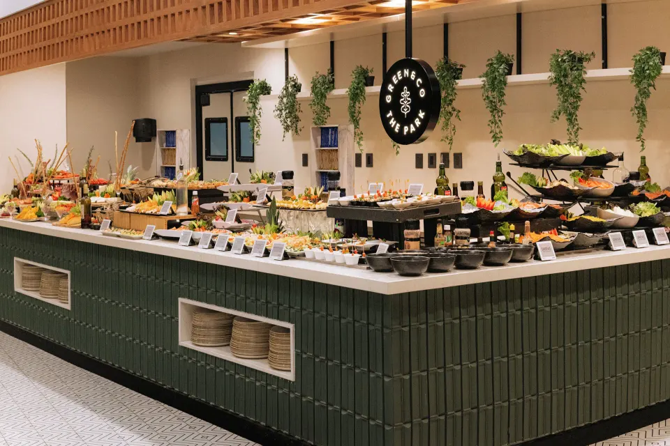Central buffet island with salad and produce station at Grand Sirenis Riviera Maya Resort & Spa