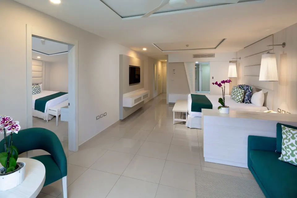 Spacious mini suite living area and bedroom at Grand Sirenis Riviera Maya Resort & Spa