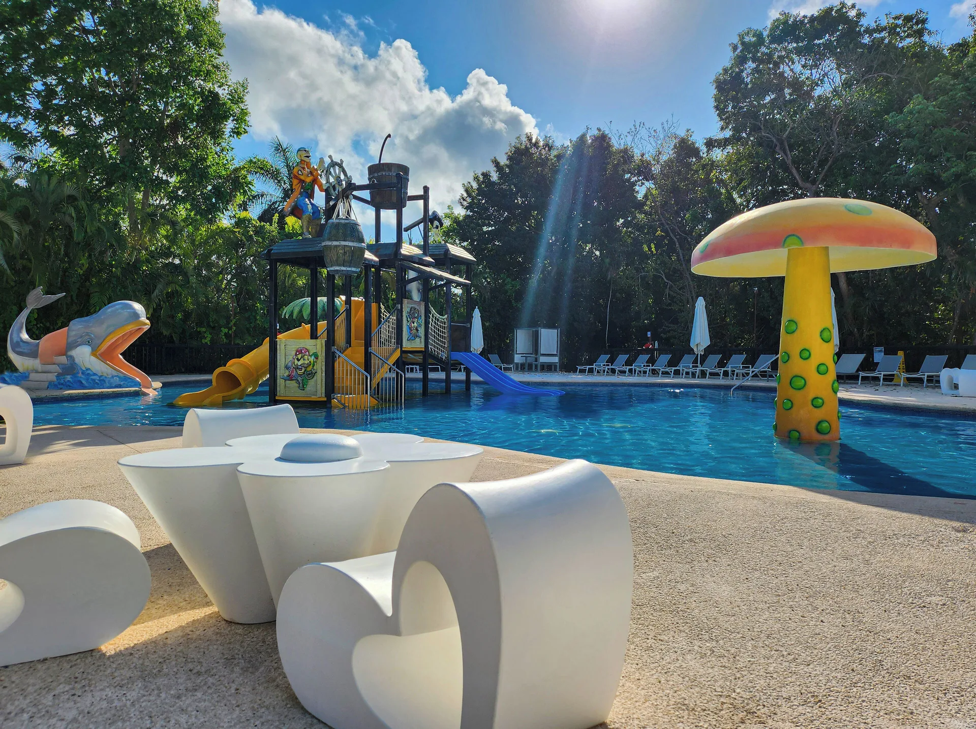 Children's pool with slides and a mushroom fountain at Grand Sunset Princess.