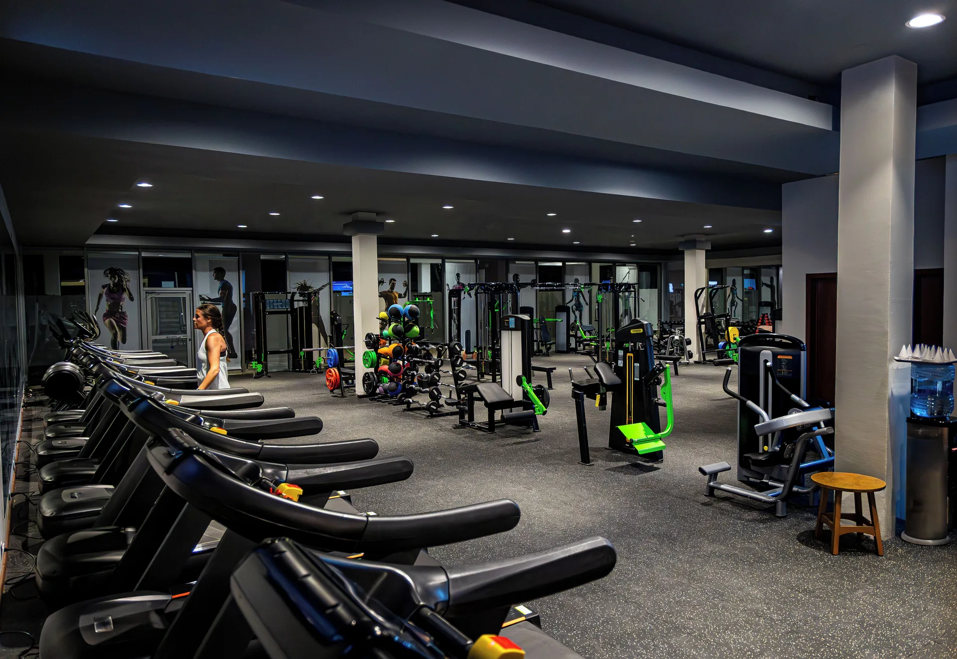 Treadmills and exercise machines in the fitness center at Grand Sunset Princess.