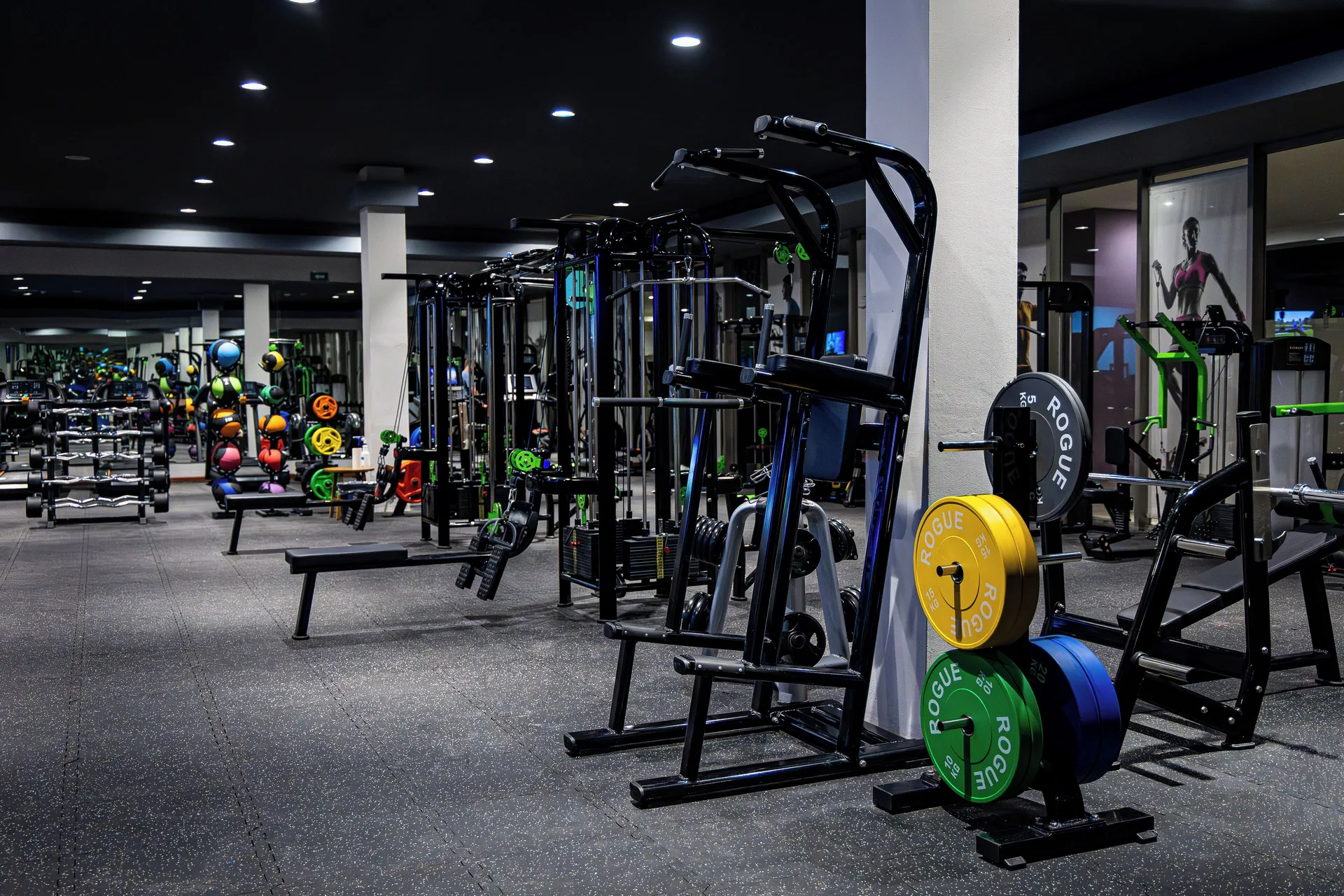 Strength machines and free weights in the fitness center at Grand Sunset Princess.