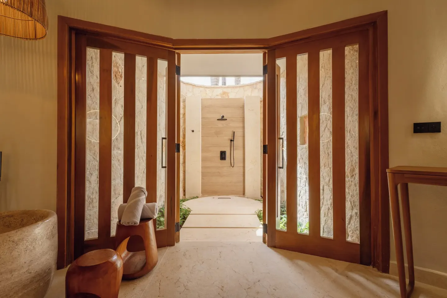 Laguna Villa Suite bathroom doors opening to outdoor shower at Grand Sunset Princess.