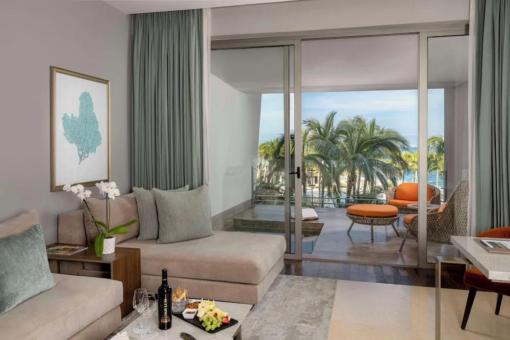 Ambassador Pool Suite sitting area and terrace at Grand Velas Los Cabos.