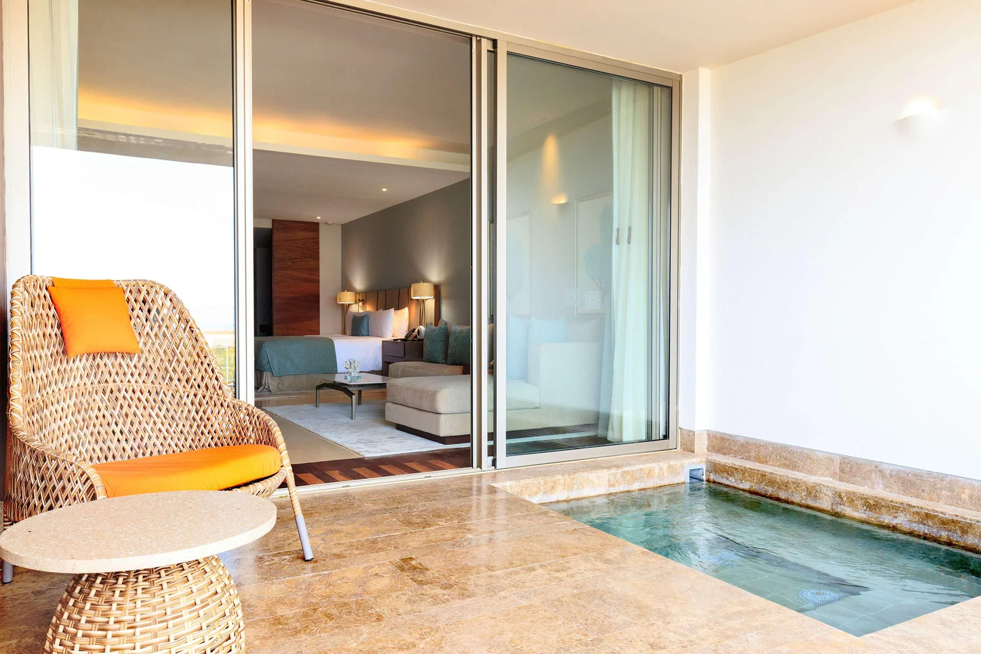 Ambassador Pool Suite terrace with plunge pool and king bed at Grand Velas Los Cabos.