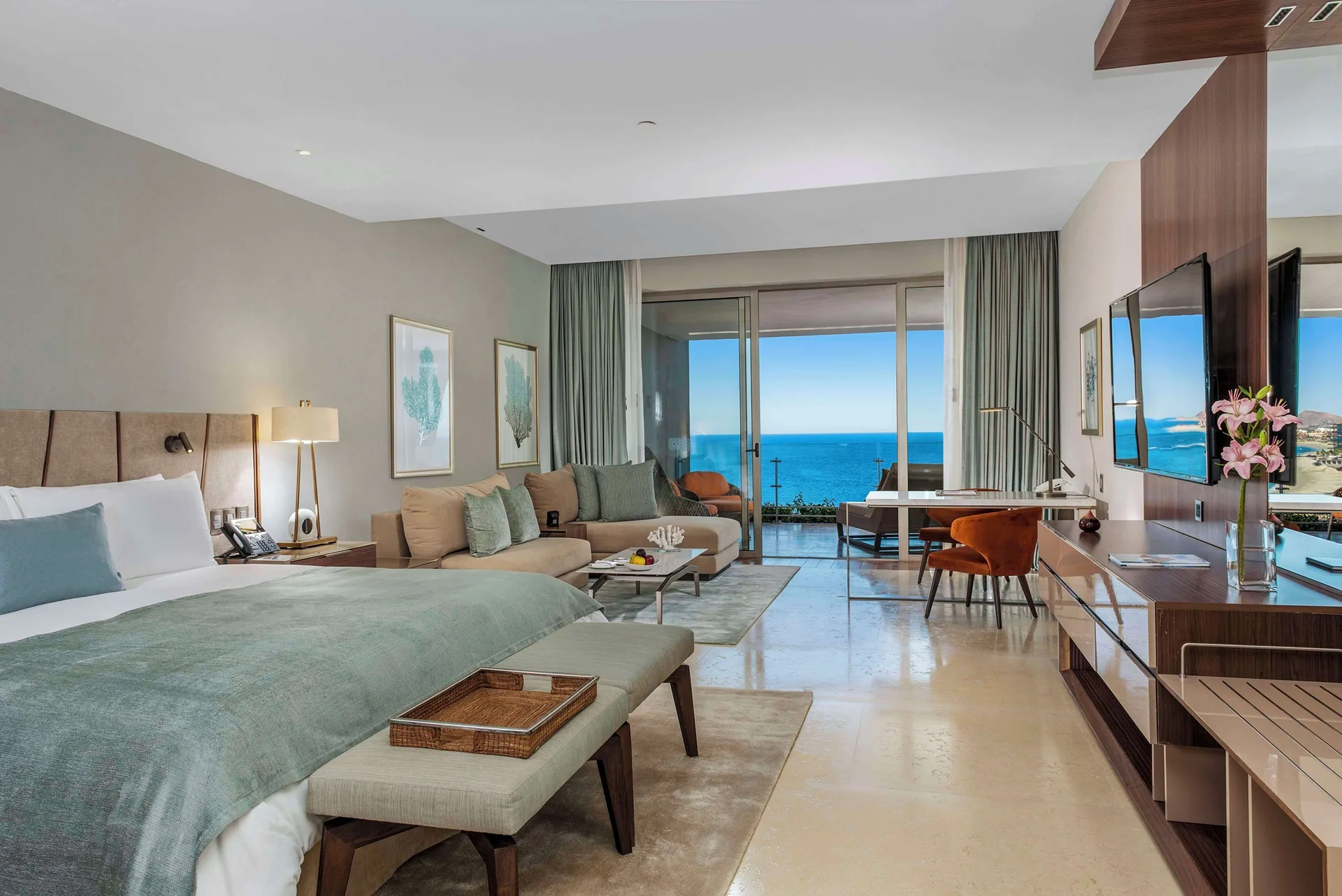 Ambassador Suite Ocean View king bed and media wall at Grand Velas Los Cabos.