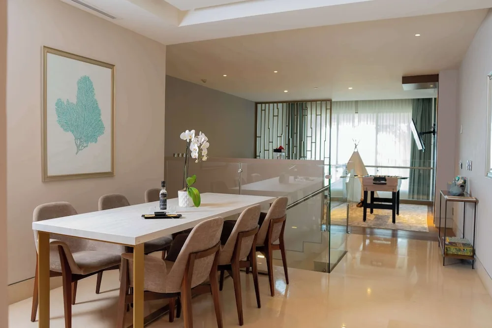 Family Duplex dining and play area with foosball table at Grand Velas Los Cabos.