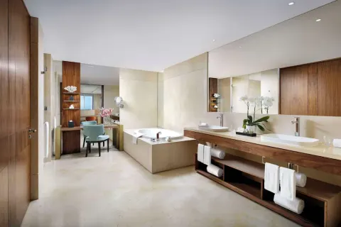 One Bedroom Governor Suite bathroom with soaking tub and double vanity at Grand Velas Los Cabos.