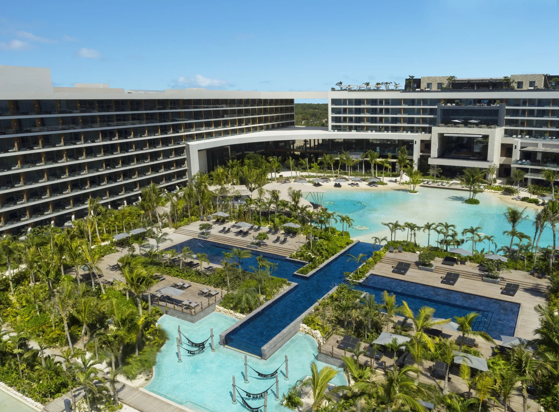 Secrets Moxché Playa del Carmen adults-only all-inclusive resort with lagoon pools and beach club