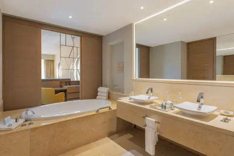 Ambassador Pool Suite Ocean View bathroom with tub at Grand Velas Riviera Maya.
