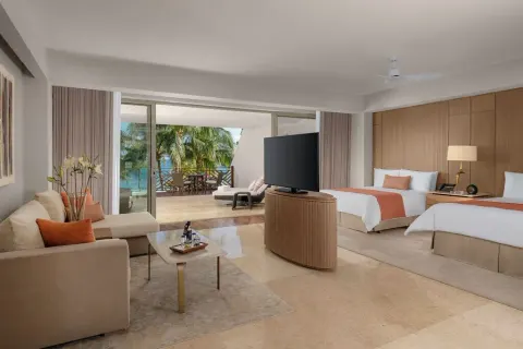 Grand Class Pool Suite Ocean Front with two beds and terrace at Grand Velas Riviera Maya.